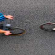 Cyclists racing on a road with motion blur